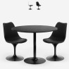 Black round Tulip dining table set 80cm with 2 transparent Haki chairs.