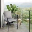 Verve padded chair with armrests for outdoor use in rope with cushions. Catalog